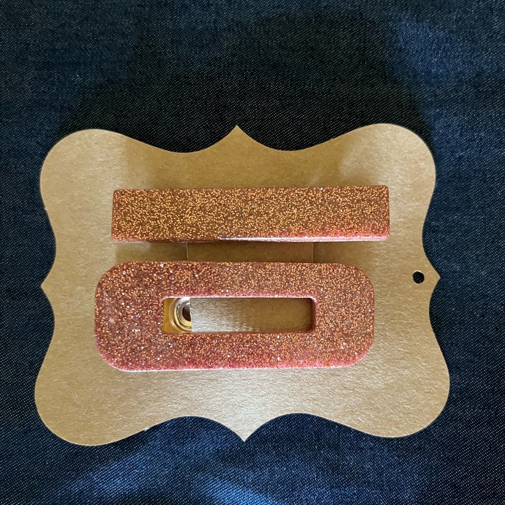 Hair Clip set: two barrettes. Rust color resin with Glitter top, clip back.